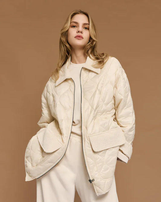 Quilted jacket with belt