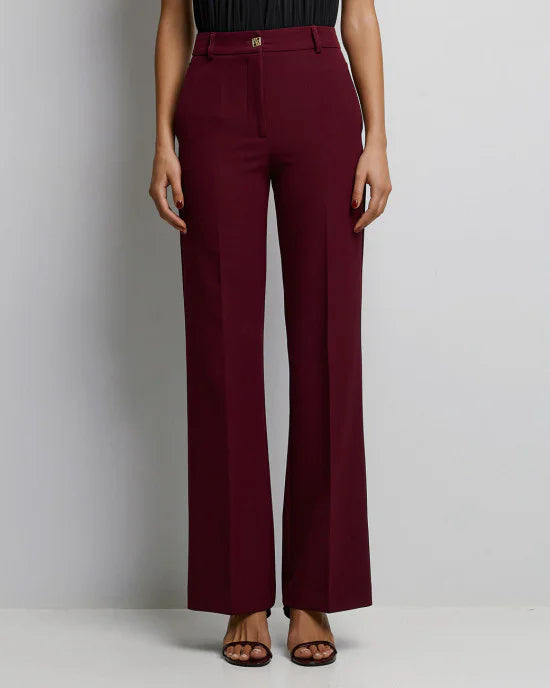 Wide-leg pants with a monogram button