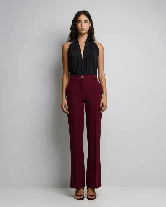 Wide-leg pants with a monogram button